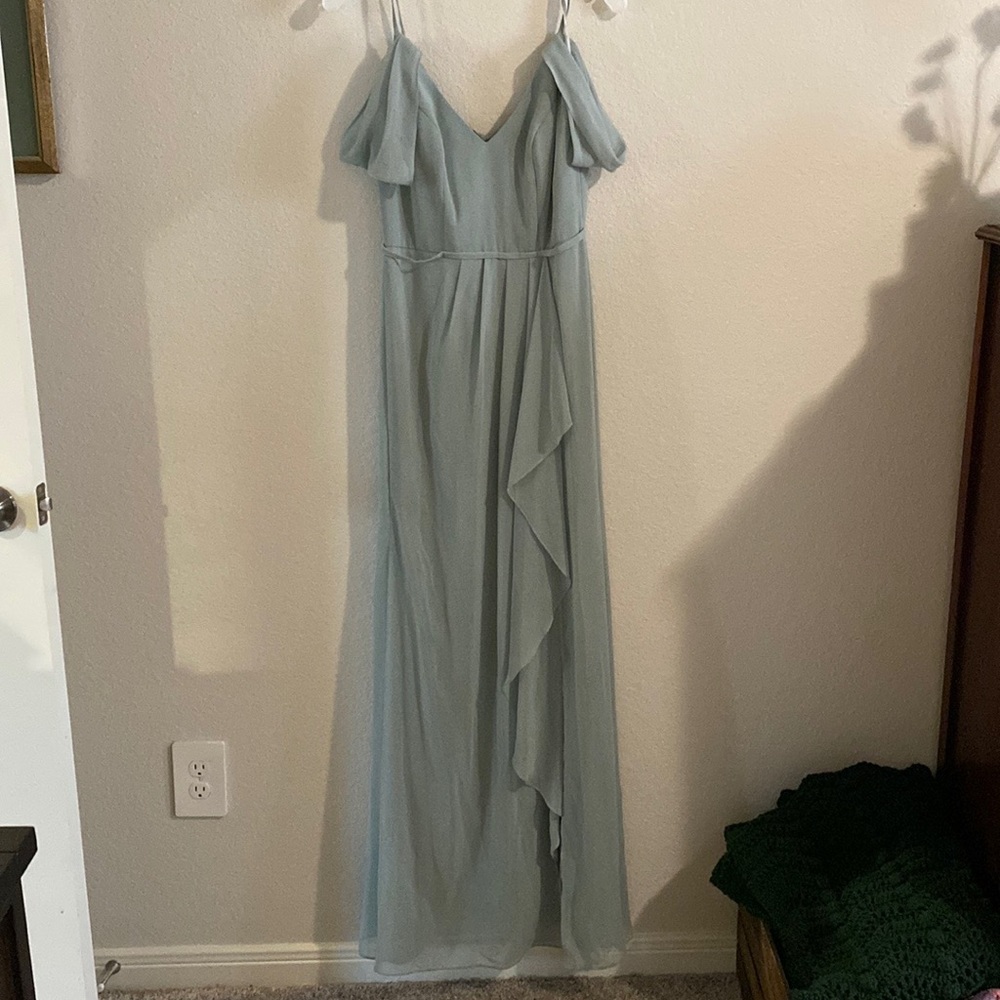 Dusty sage green David’s bridal off the shoulder cascade bridesmaid dress flowy